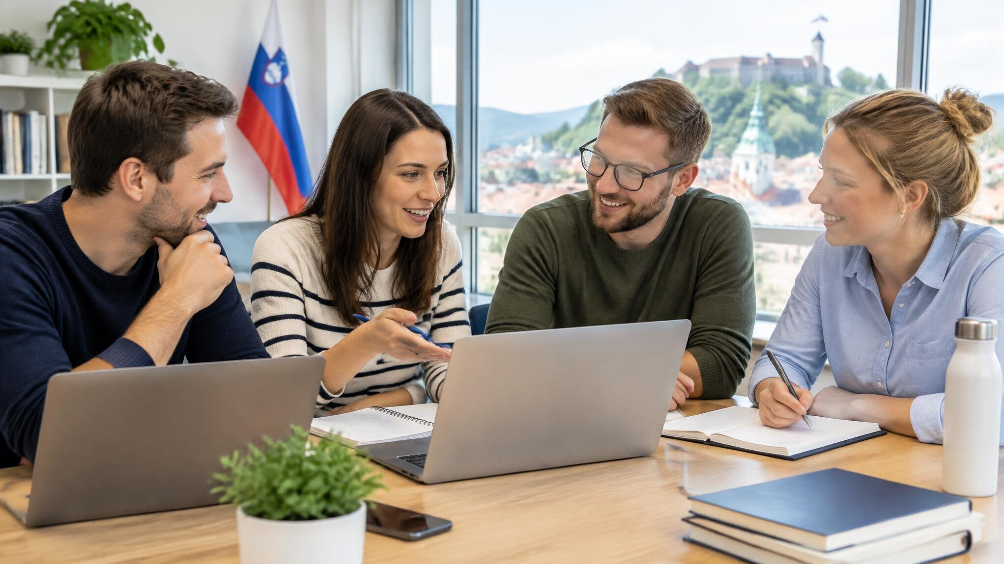 Group of people studying together with laptops