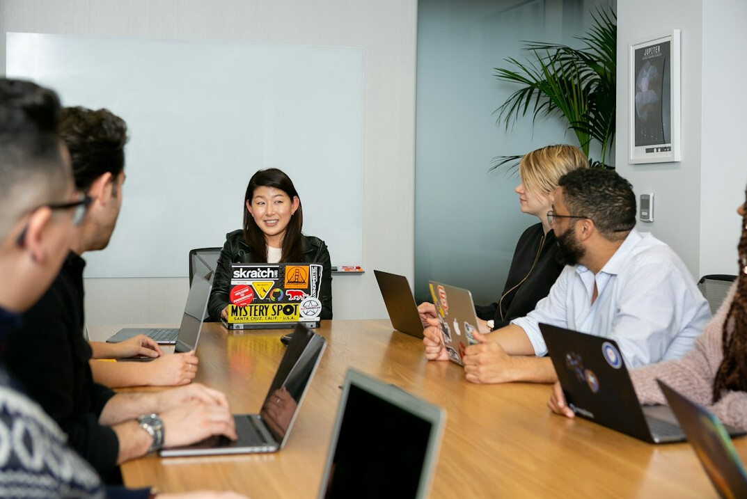 team leader discussing with employees